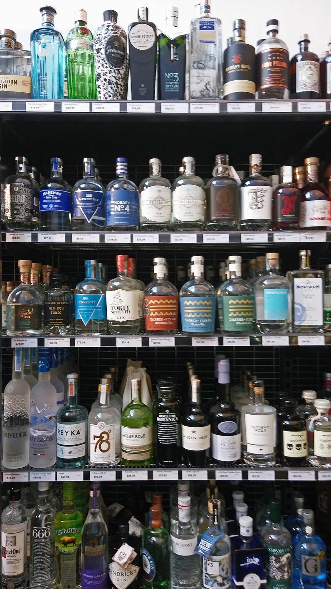 well stocked gin shelves in Tasmanian bottle shop